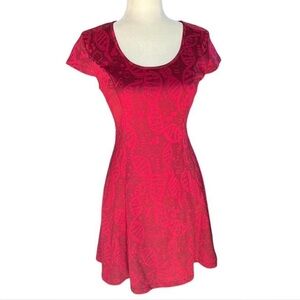Hot Topic Orphan Black red DNA patterned mini skater dress with tie back detail.